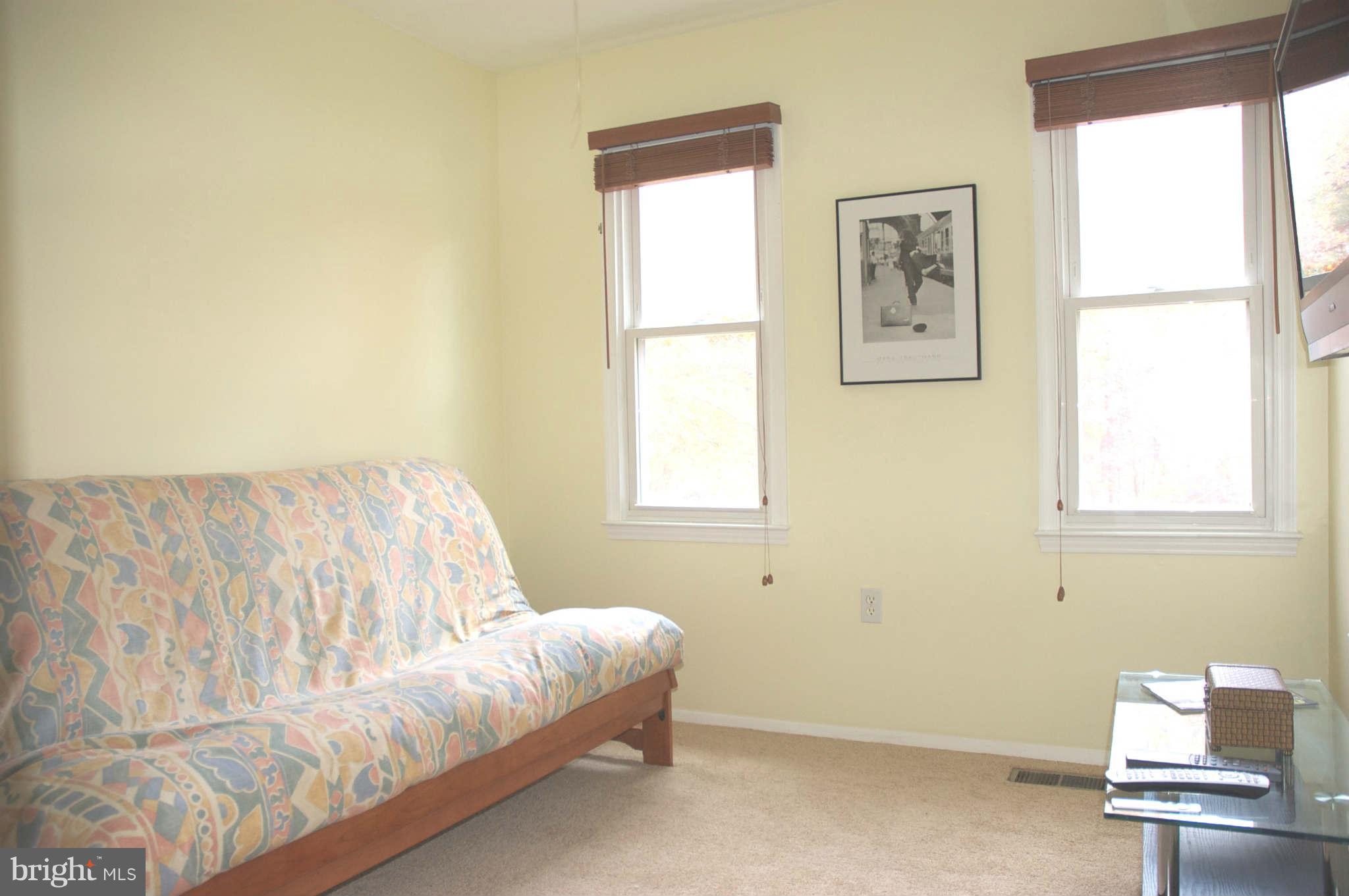 12405 Melmark Court Reston, VA 20191 - Photo 15 of 30 a bedroom with a bed and a window