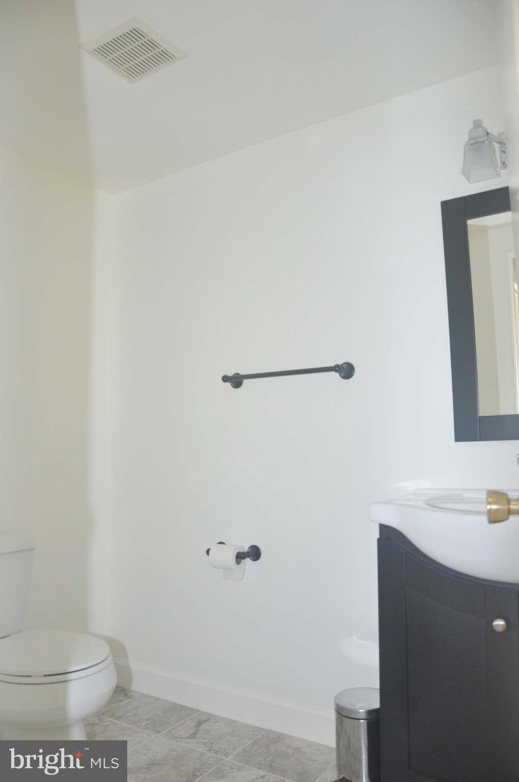 12405 Melmark Court Reston, VA 20191 - Photo 21 of 30 a bathroom with a sink and a toilet