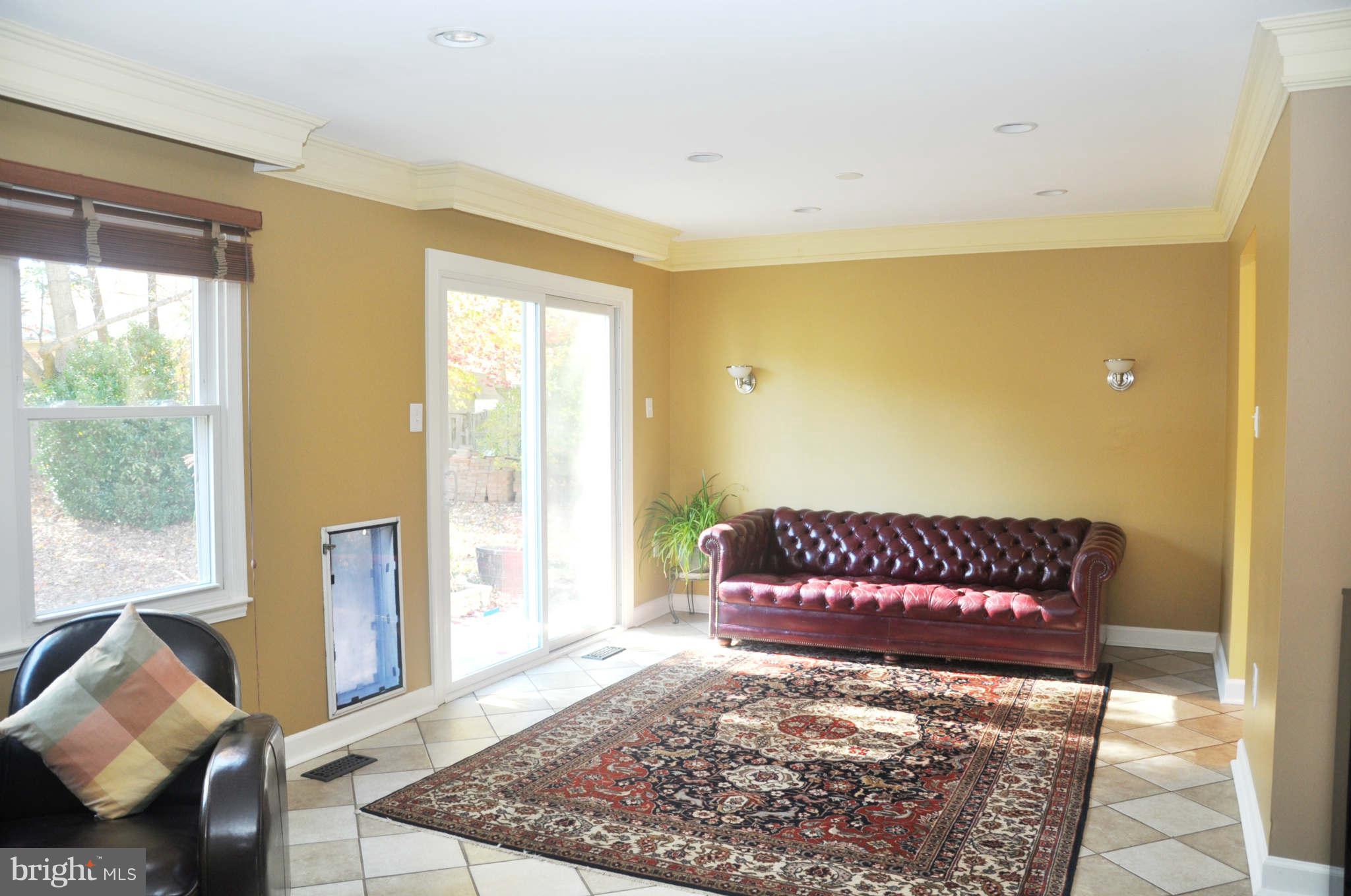 12405 Melmark Court Reston, VA 20191 - Photo 25 of 30 a view of a bedroom with furniture and windows