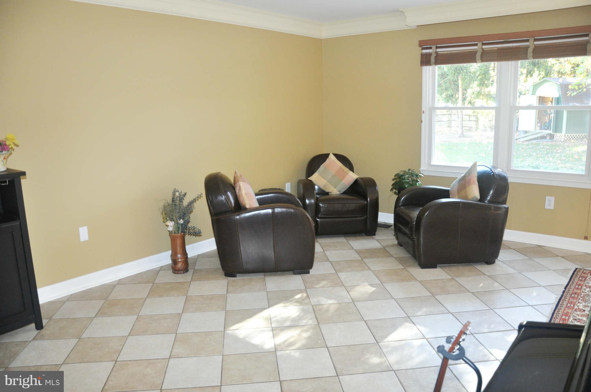 12405 Melmark Court Reston, VA 20191 - Photo 26 of 30 a living room with furniture and a window