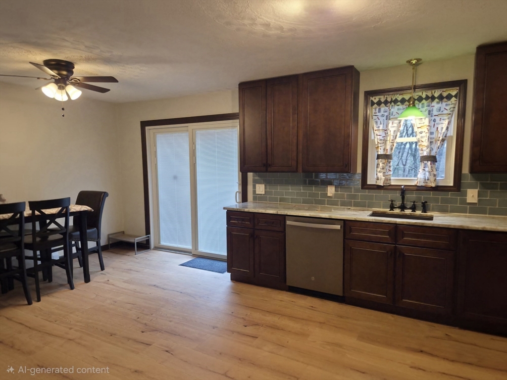 35 Pine Ridge Drive Oxford, MA 01540 - Photo 3 of 19 a kitchen with granite countertop a sink cabinets and window