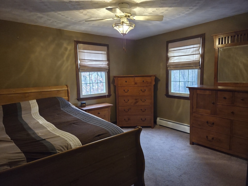 35 Pine Ridge Drive Oxford, MA 01540 - Photo 8 of 19 a living room with furniture and window