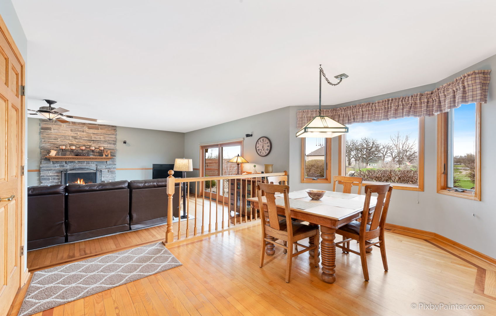 8214 Harmony Hill Road Marengo, IL 60152 - Photo 12 of 34 a dining room with furniture window wooden floor