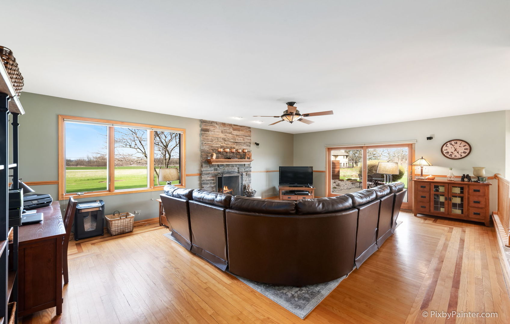 8214 Harmony Hill Road Marengo, IL 60152 - Photo 18 of 34 a living room with furniture and a flat screen tv