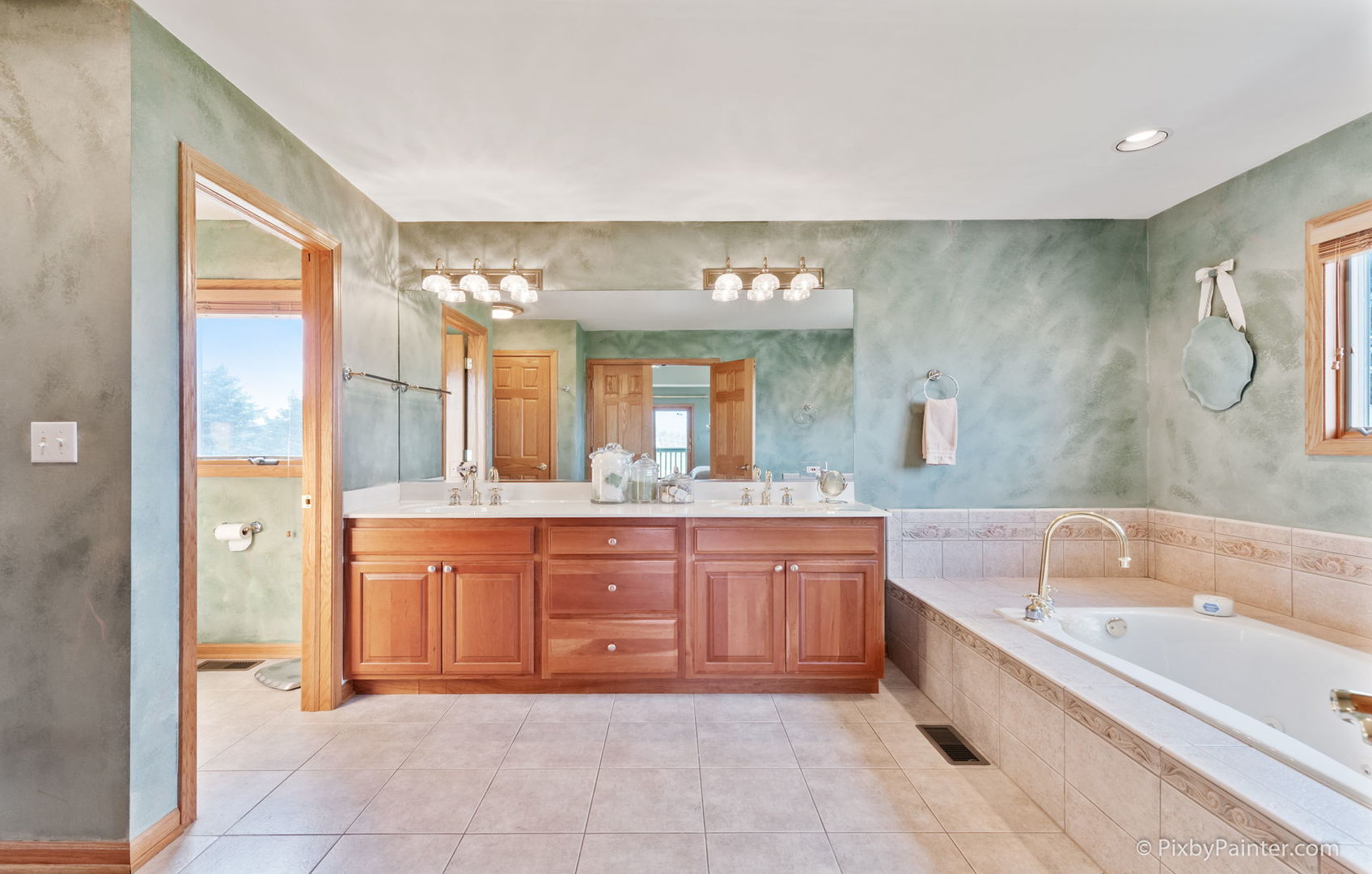 8214 Harmony Hill Road Marengo, IL 60152 - Photo 23 of 34 a large bathroom with a large tub and sink
