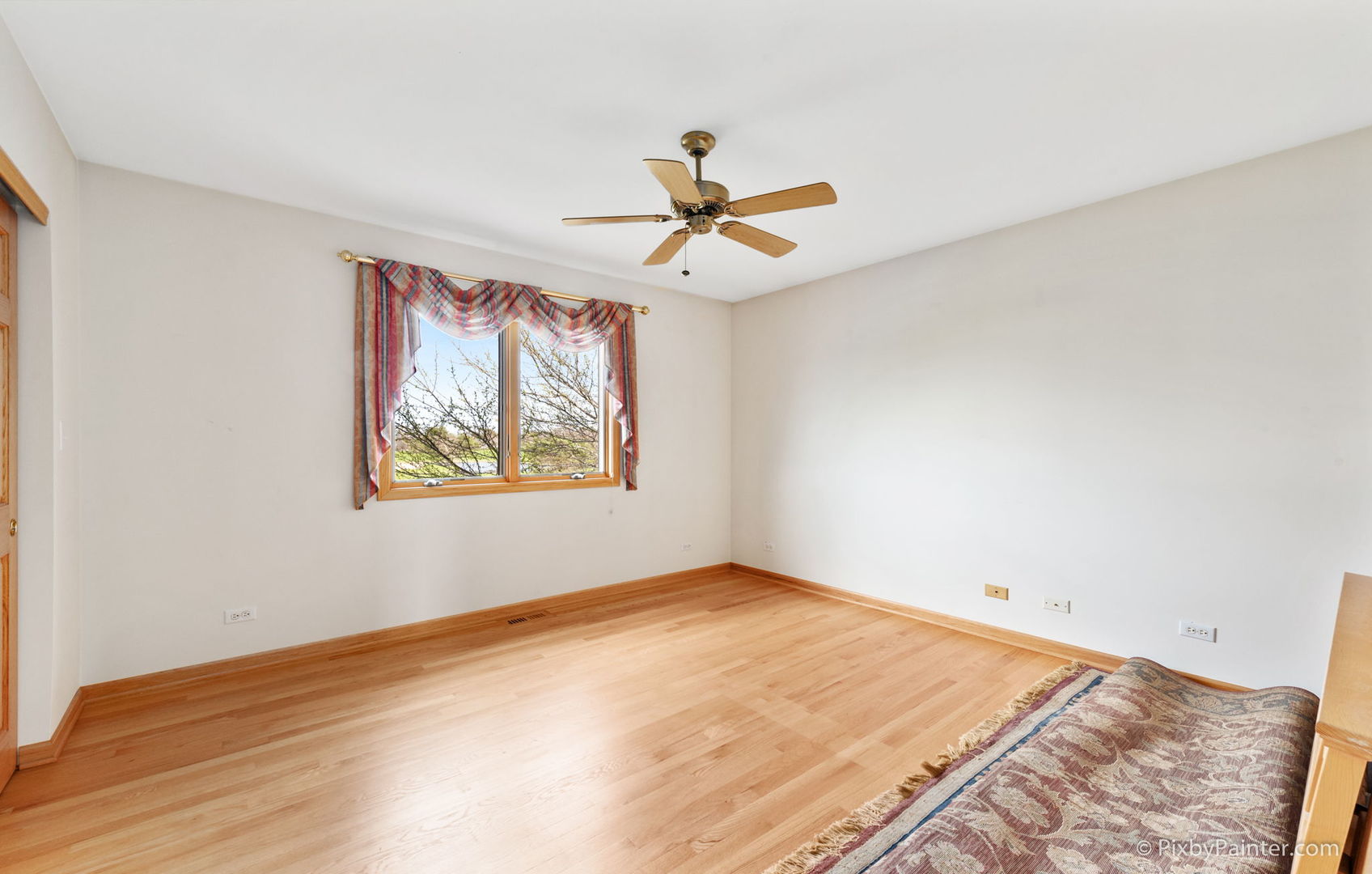 8214 Harmony Hill Road Marengo, IL 60152 - Photo 26 of 34 wooden floor in an empty room with a window