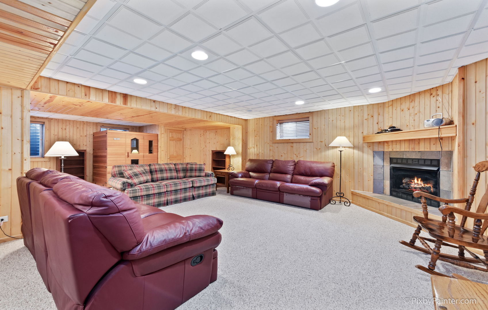8214 Harmony Hill Road Marengo, IL 60152 - Photo 28 of 34 a living room with furniture a fireplace and a table