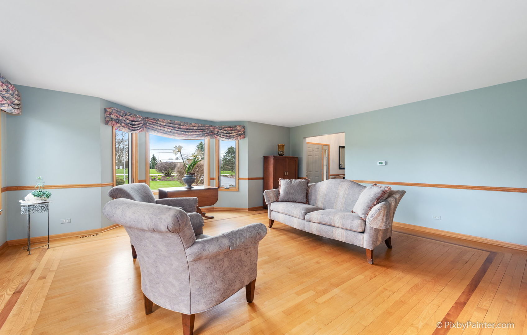 8214 Harmony Hill Road Marengo, IL 60152 - Photo 7 of 34 a living room with furniture and a large window