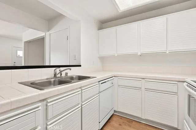 a bathroom with a bathtub and a toilet