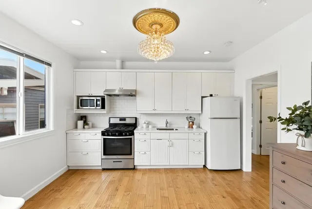 a view of a dining room with furniture