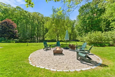 a view of a garden with a patio