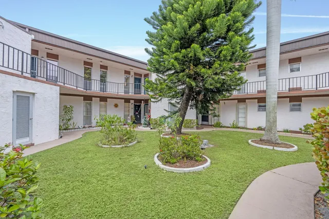 a aerial view of a house with a swimming pool