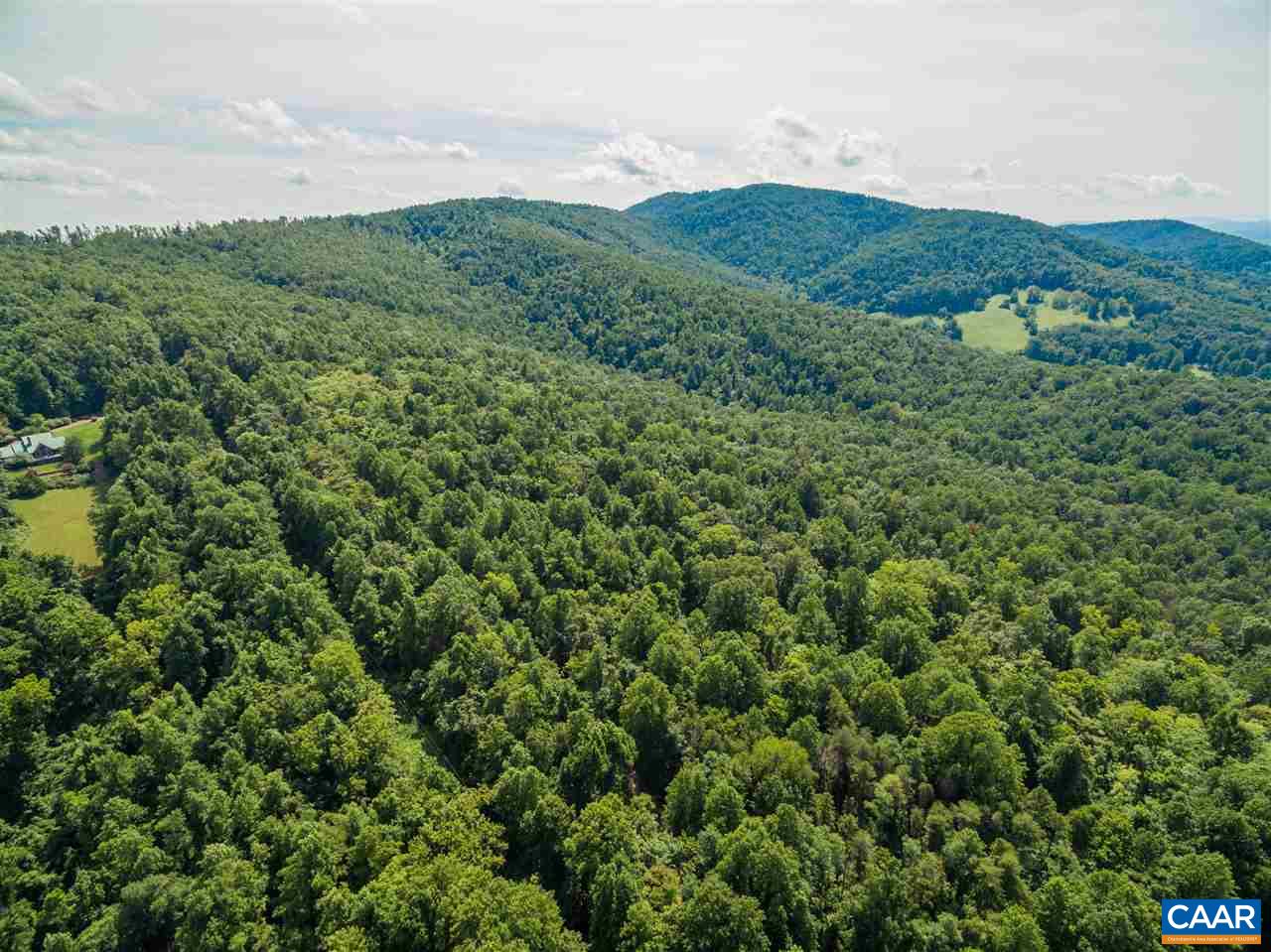 Lot 01800 Sam Mundy Road Barboursville, VA 22923 - Photo 7 of 50 a view of a lush green hillside and a mountain
