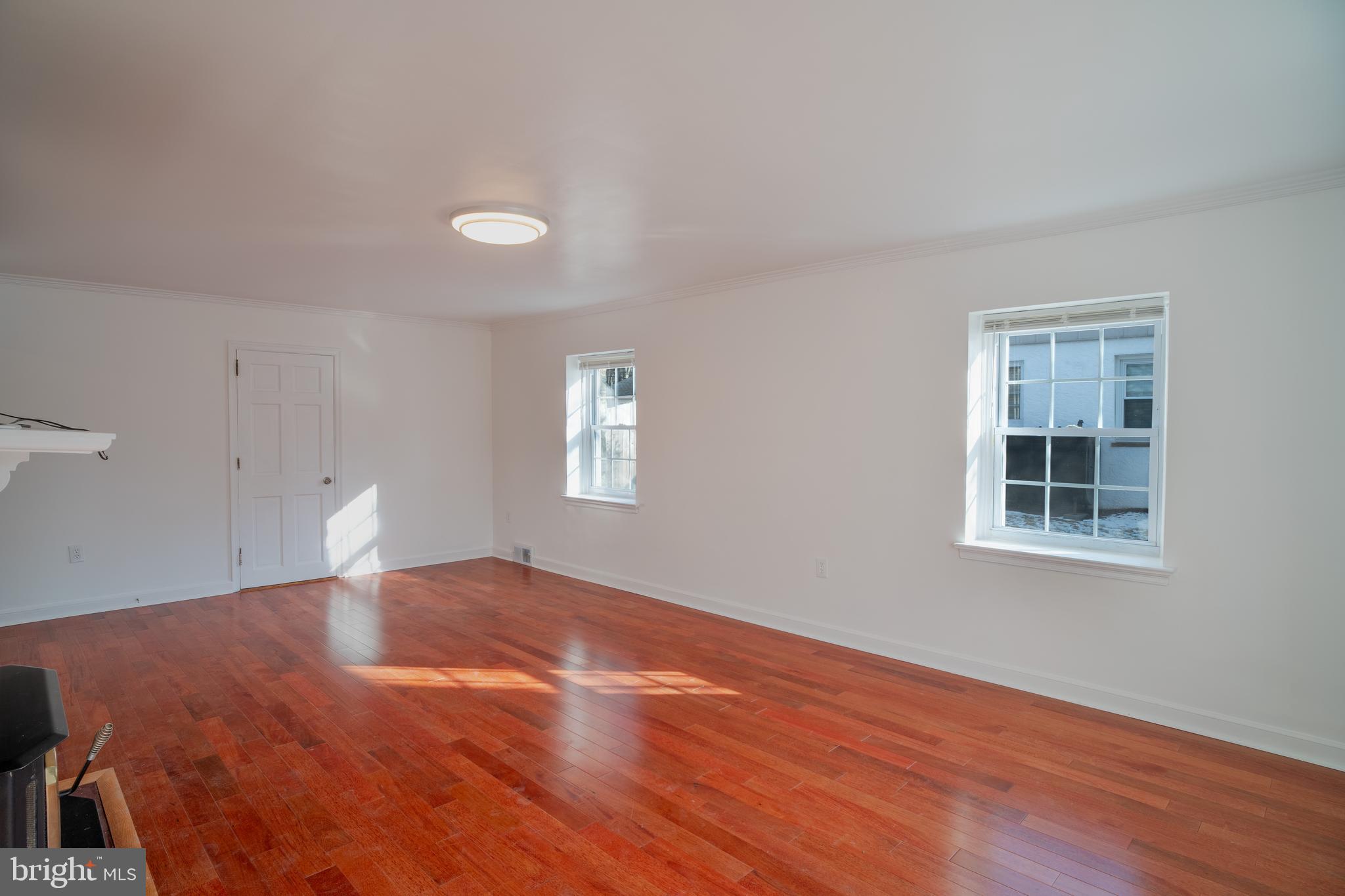 11 Wharton Lane Cheltenham, PA 19012 - Photo 6 of 17 a view of a bedroom with window and hardwood floor