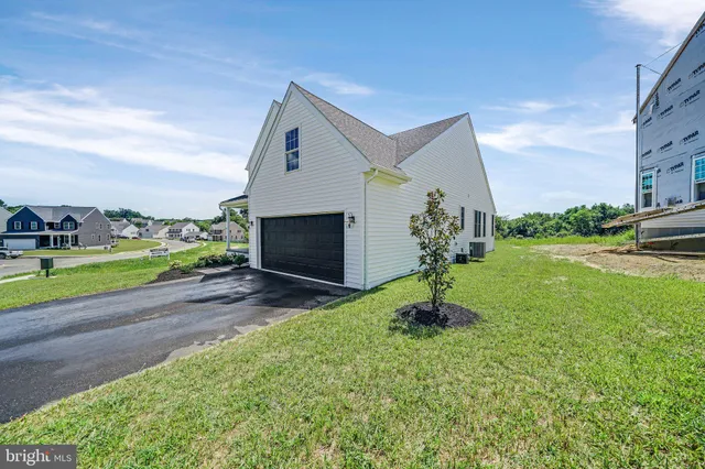 a view of a house with a big yard