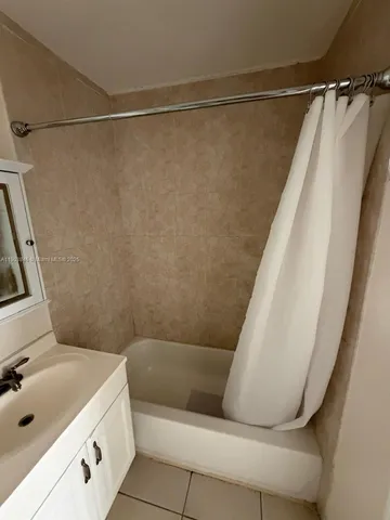 a bathroom with a sink and a tub