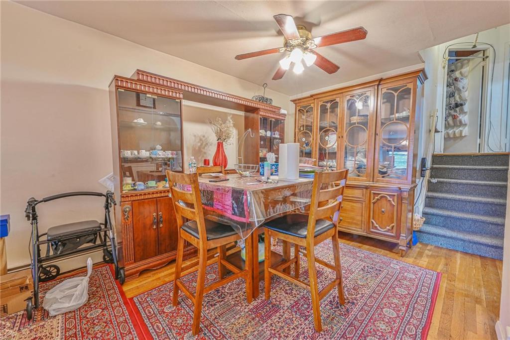 237 74th Street Brooklyn, NY 11209 - Photo 15 of 20 a view of a dining room with furniture window and wooden floor