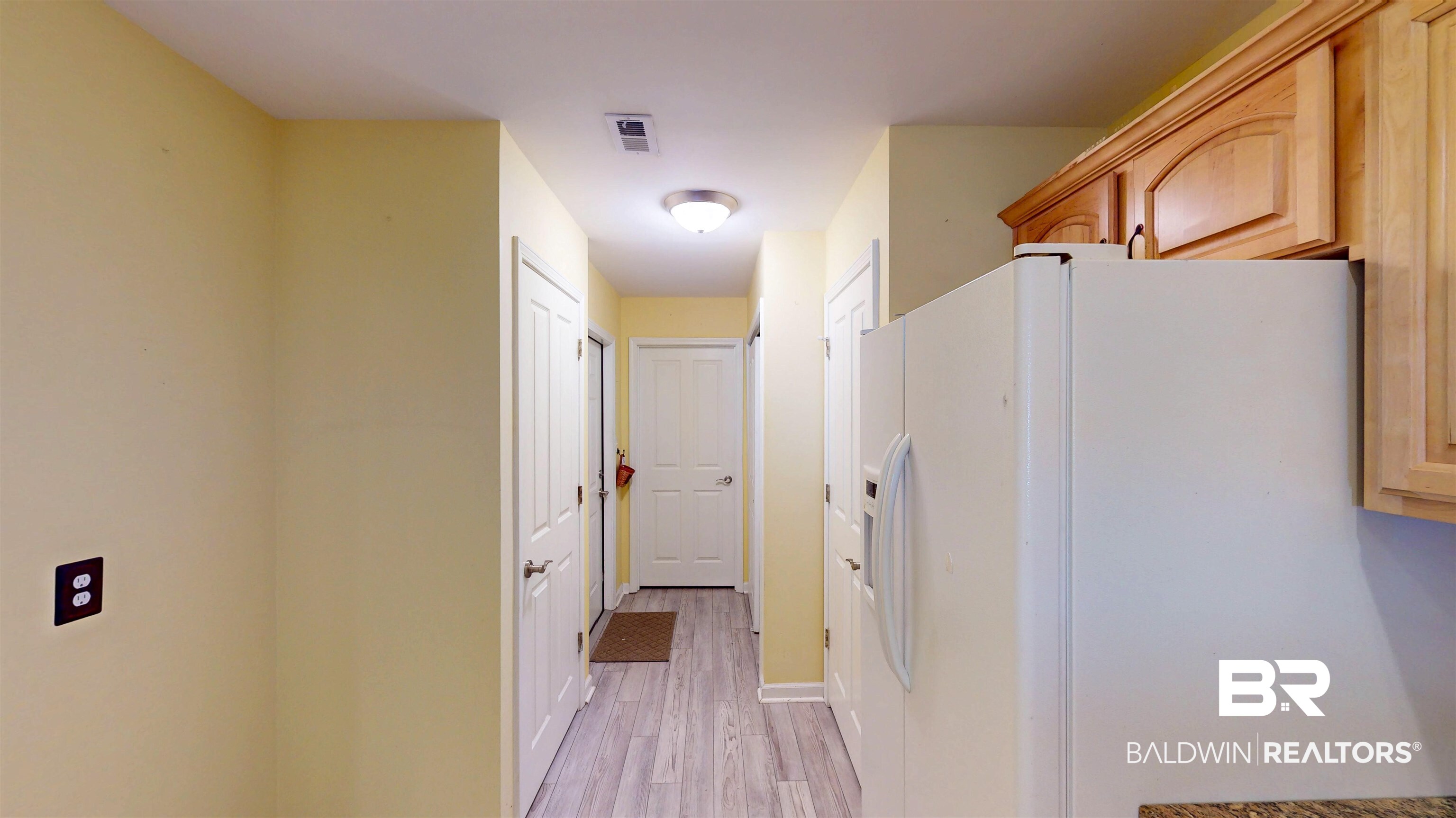 303 Wyld Palms Drive, Unit 303 Foley, AL 36535 - Photo 15 of 36 Hall featuring light wood finished floors and baseboards
