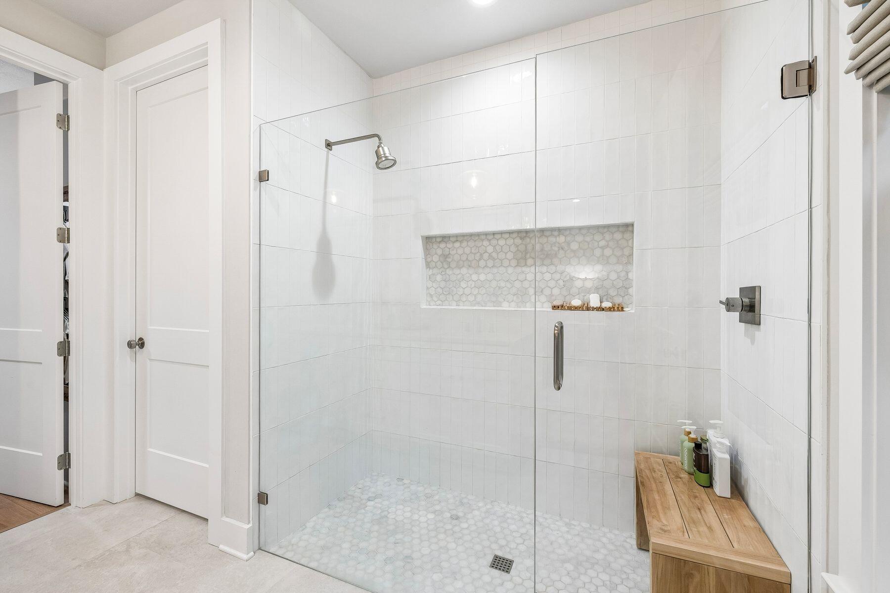 39 West Captain Fritz Way Freeport, FL 32439 - Photo 16 of 33 a bathroom with a shower