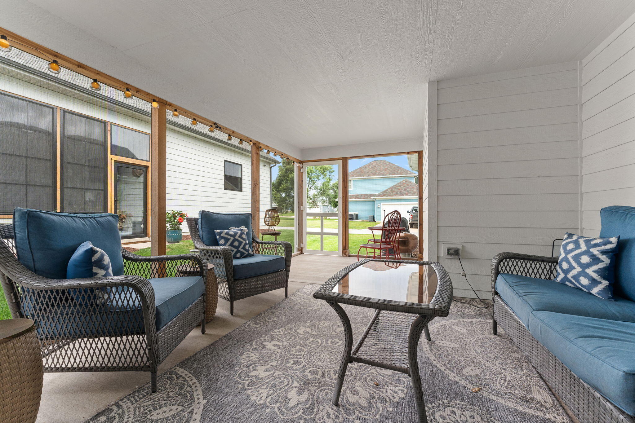 5956 Beacon Lane Portage, IN 46368 - Photo 21 of 57 a living room with furniture and a large window