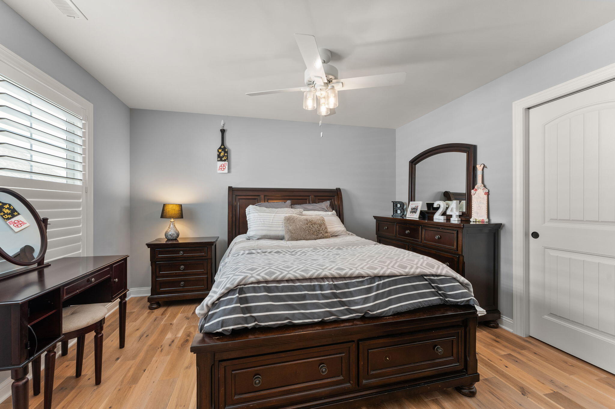 5956 Beacon Lane Portage, IN 46368 - Photo 26 of 57 a bedroom with bed and wooden floor