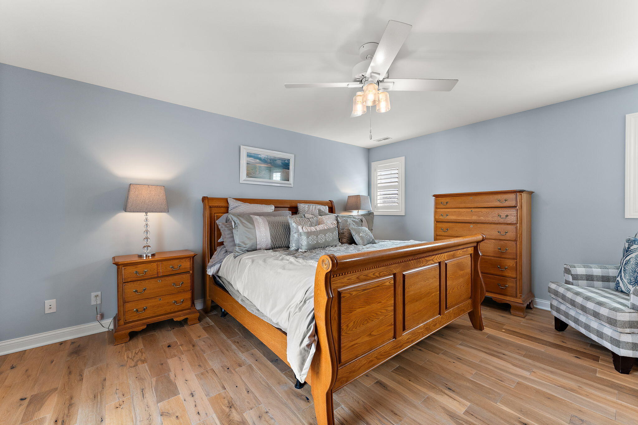 5956 Beacon Lane Portage, IN 46368 - Photo 30 of 57 a bedroom with a bed and a chandelier