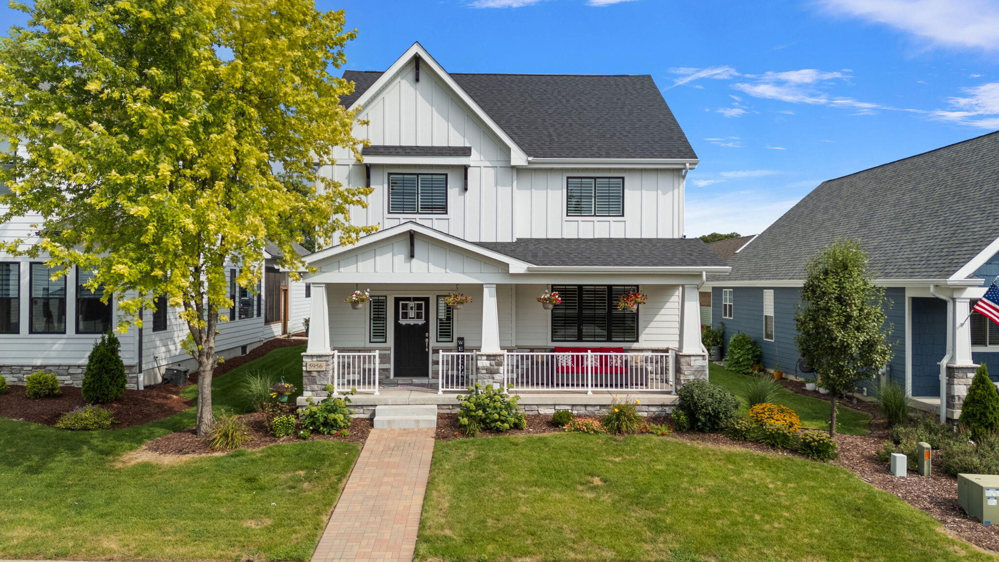 5956 Beacon Lane Portage, IN 46368 - Photo 3 of 57 front view of a house with a yard