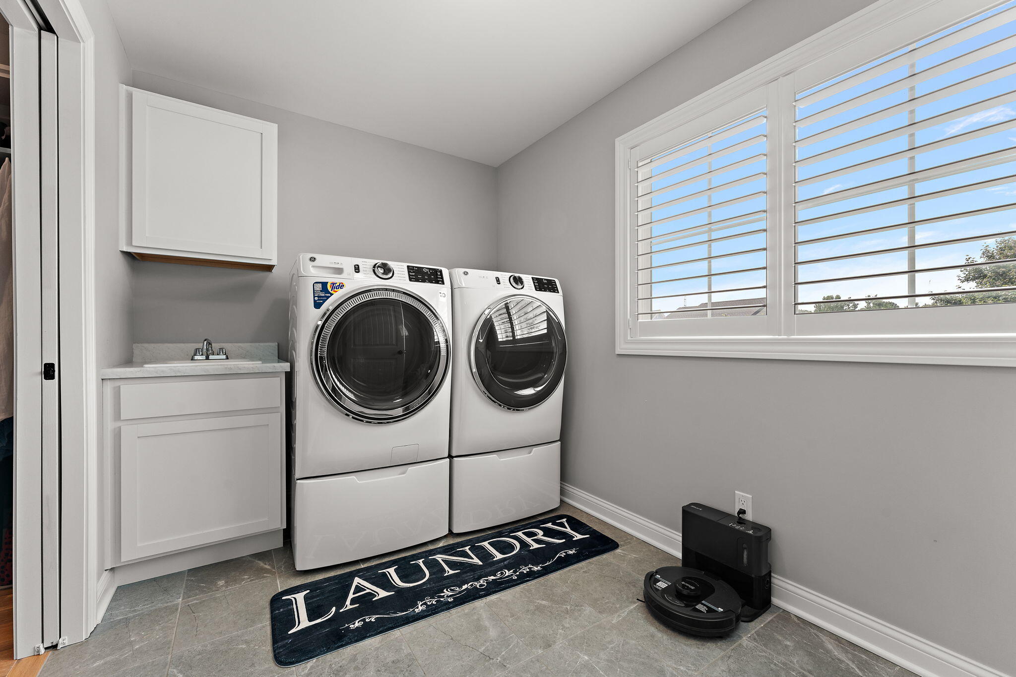 5956 Beacon Lane Portage, IN 46368 - Photo 37 of 57 a utility room with dryer and washer