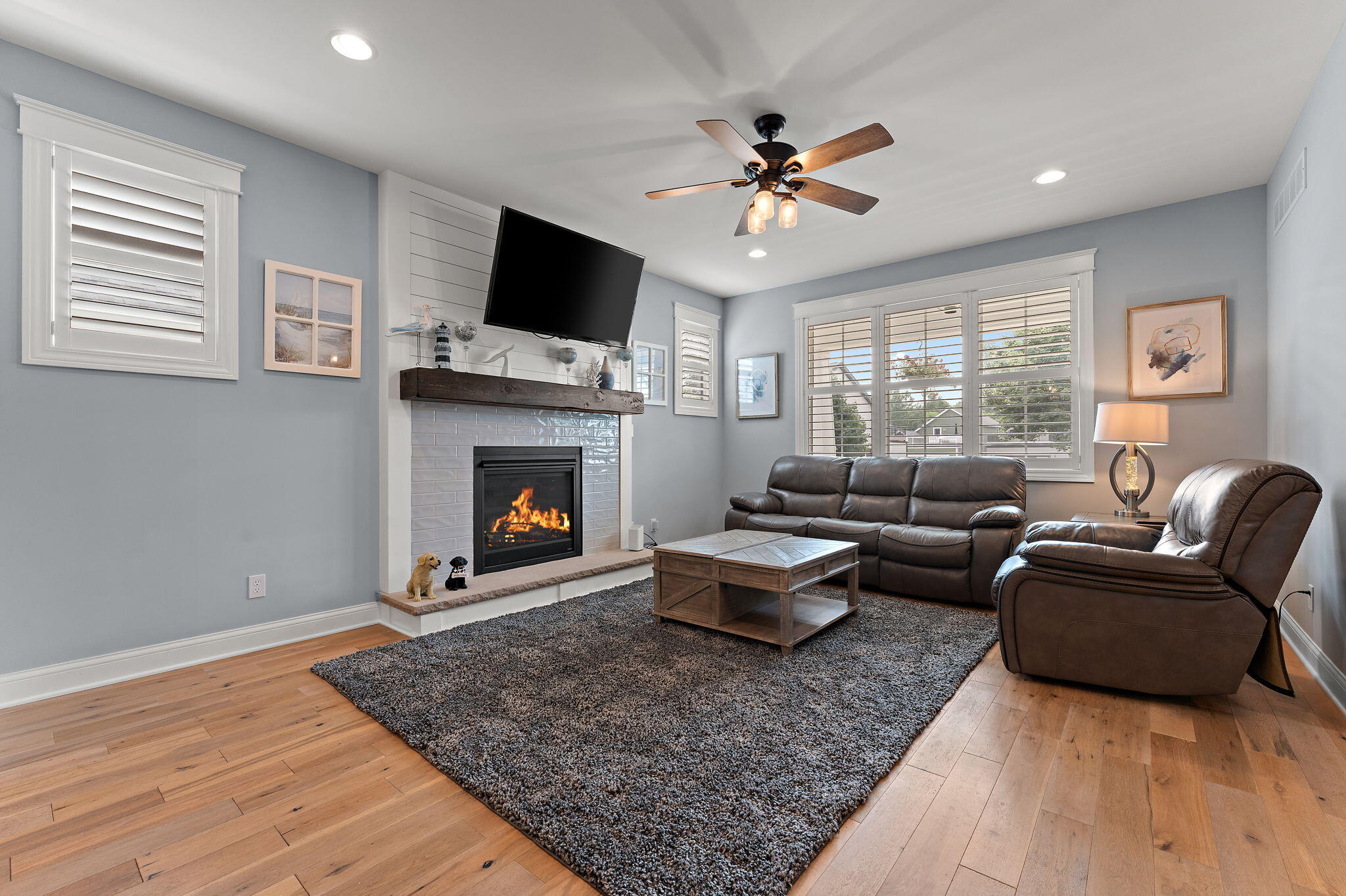 5956 Beacon Lane Portage, IN 46368 - Photo 7 of 57 a living room with furniture and a fireplace