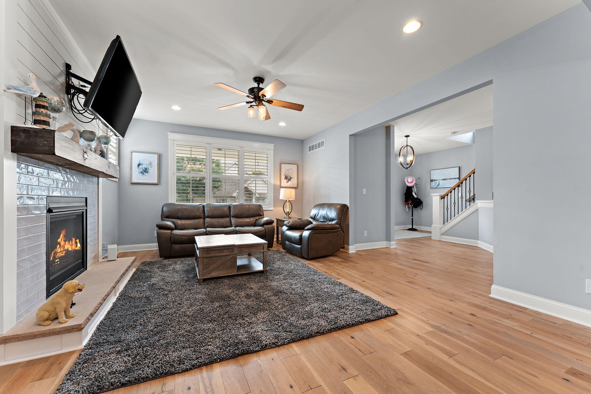 5956 Beacon Lane Portage, IN 46368 - Photo 8 of 57 a living room with furniture and a fireplace