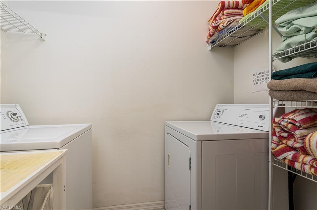 1927 Morning Sun Lane, Unit F27 Naples, FL 34119 - Photo 16 of 17 a utility room with dryer and washer