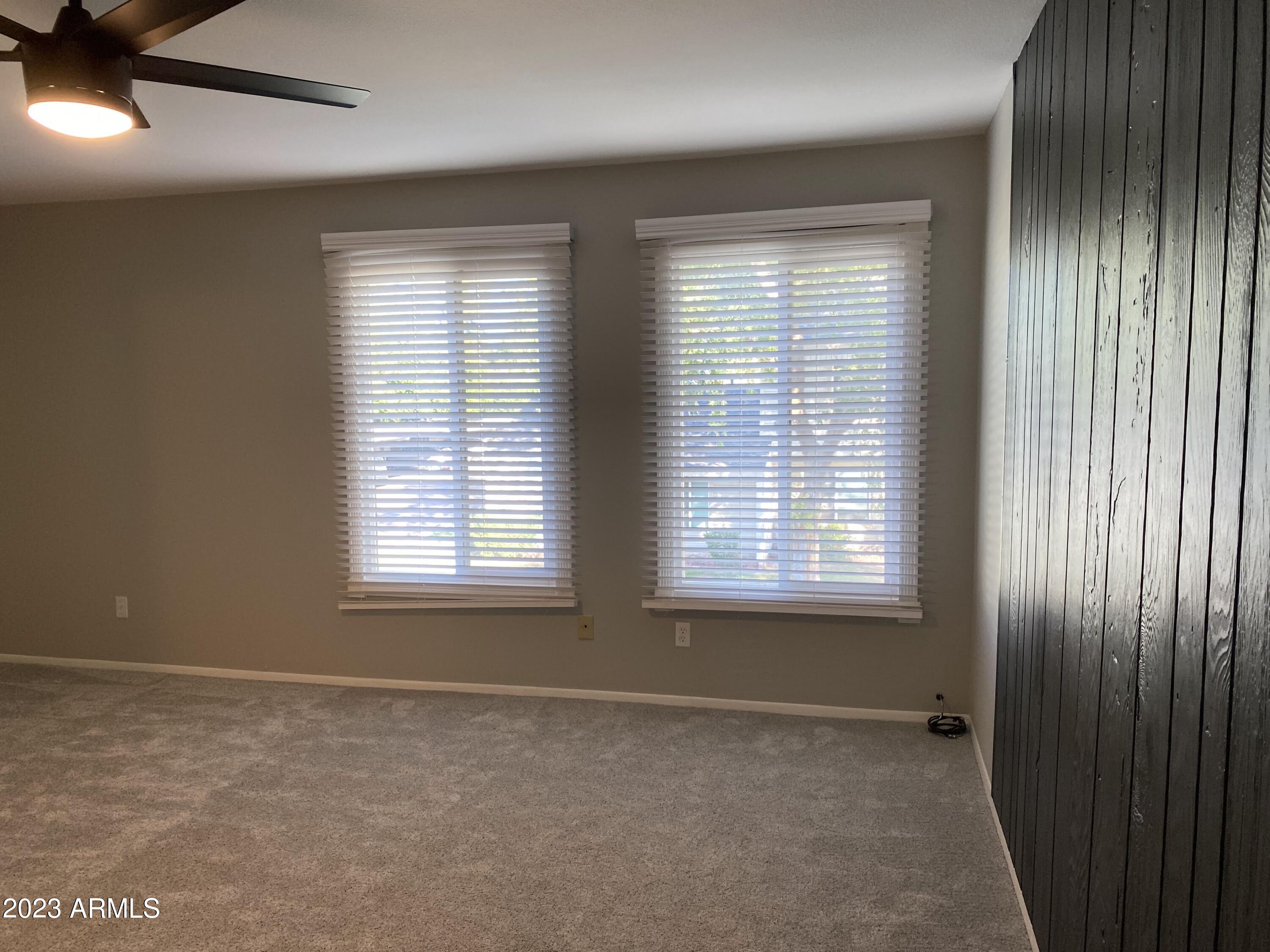 6617 South Granada Drive Tempe, AZ 85283 - Photo 7 of 20 a view of an empty room with a window