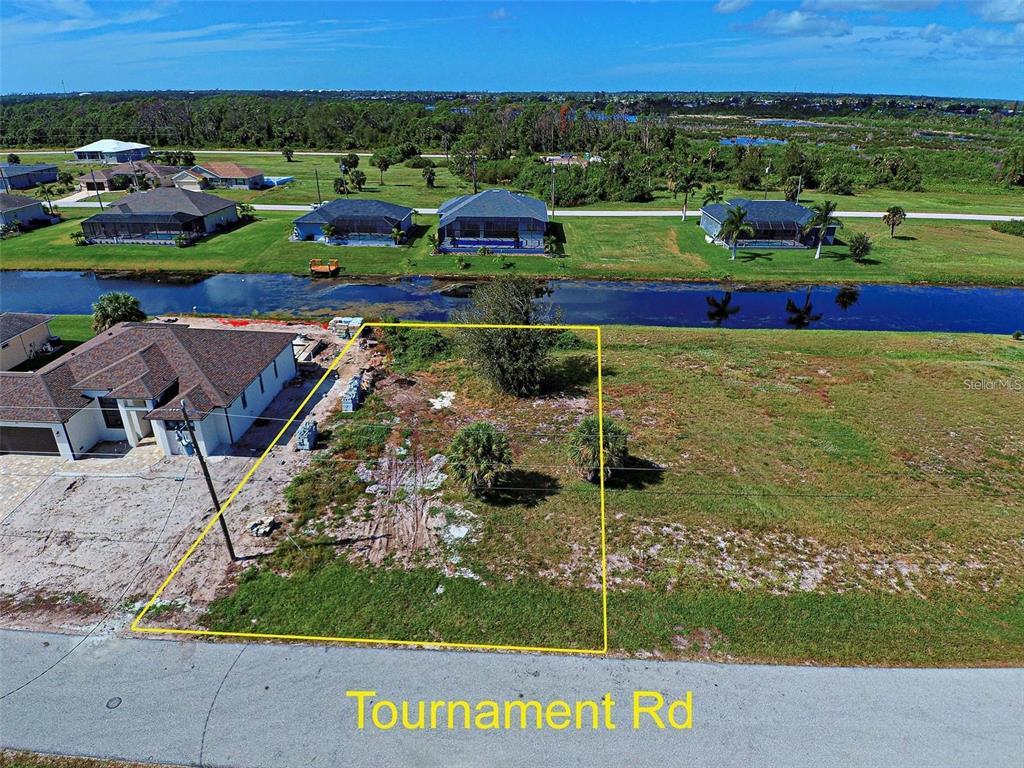 159 Tournament Road Rotonda West, FL 33947 - Photo 6 of 7 an aerial view of multiple house