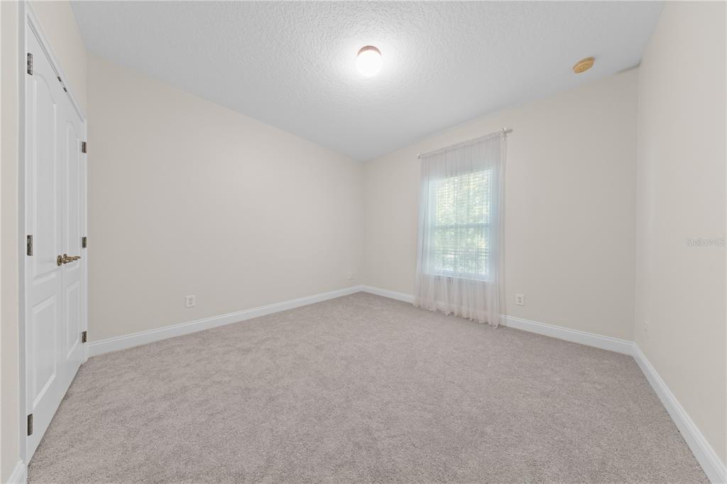 7224 Halton Court Windermere, FL 34786 - Photo 30 of 50 an empty room with a window