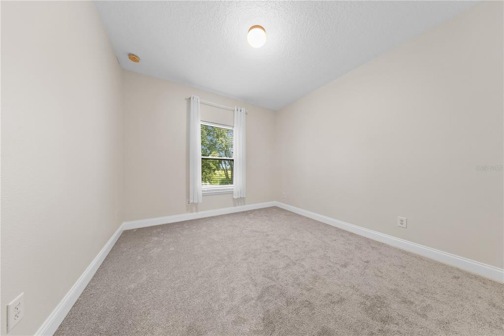7224 Halton Court Windermere, FL 34786 - Photo 32 of 50 an empty room with a window