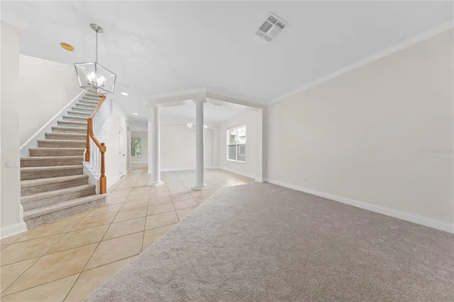a kitchen with a stove a sink and a microwave