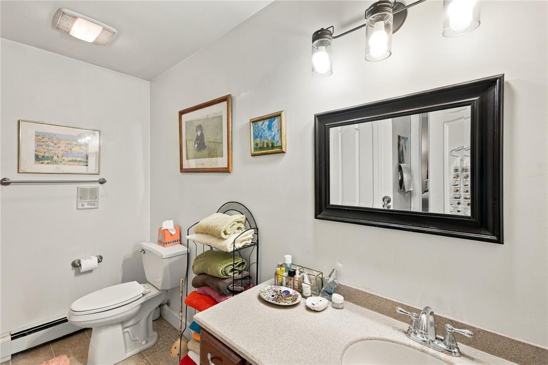 1255 Clearview Road Coplay, PA 18037 - Photo 40 of 54 Smooth laminate counters and simple flooring define this functional bathroom space.