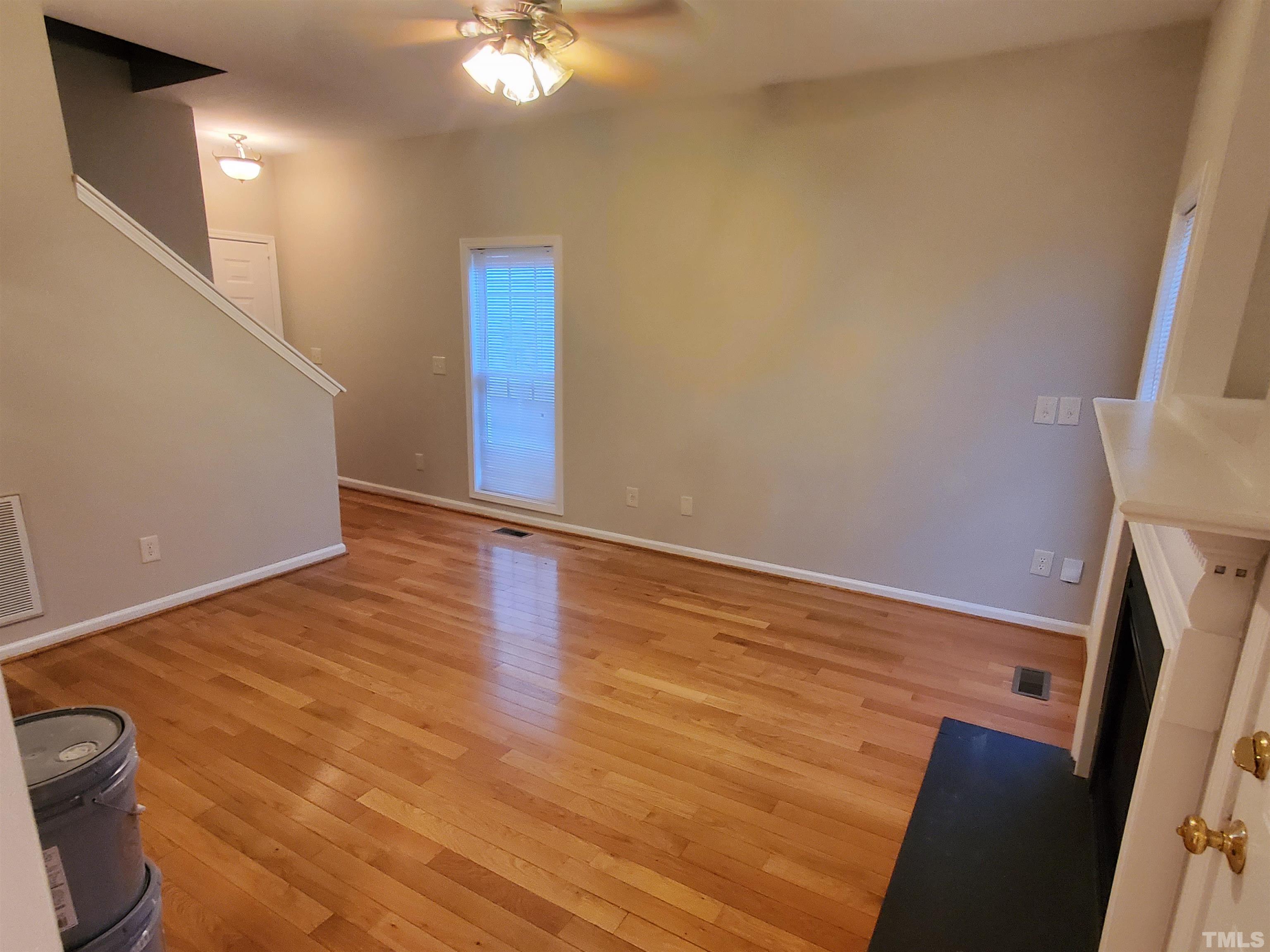 4216 Beacon Crest Way Raleigh, NC 27604 - Photo 11 of 22 a view of an empty room with wooden floor