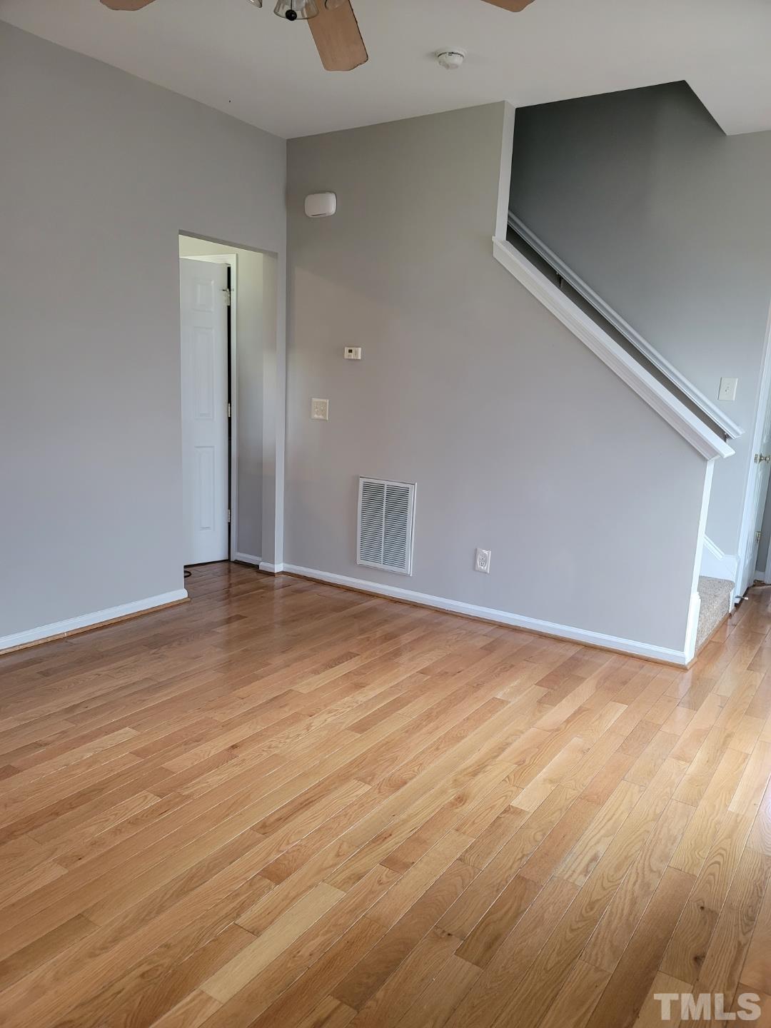 4216 Beacon Crest Way Raleigh, NC 27604 - Photo 17 of 22 a view of empty room with wooden floor