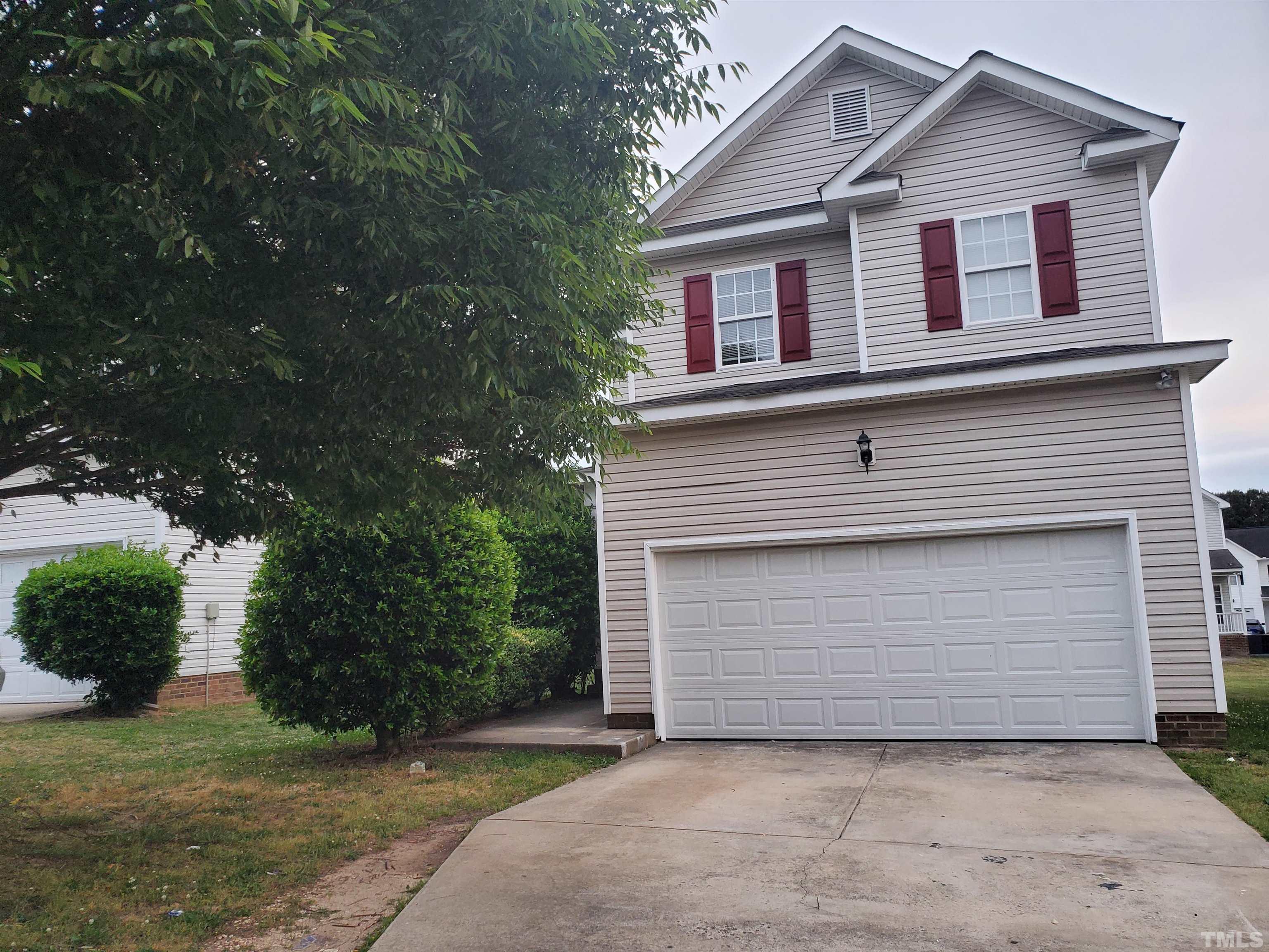 4216 Beacon Crest Way Raleigh, NC 27604 - Photo 3 of 22 a front view of a house with a garage