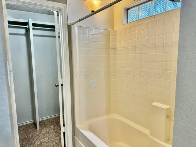 a bathroom with a bathtub