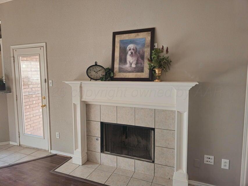 1918 75th Street Lubbock, TX 79423 - Photo 3 of 14 a view of a livingroom with a fireplace