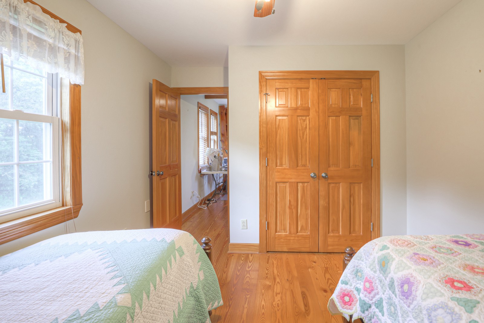 1421 Pea Ridge Road Manchester, TN 37355 - Photo 30 of 62 a bedroom with a bed and wooden floor