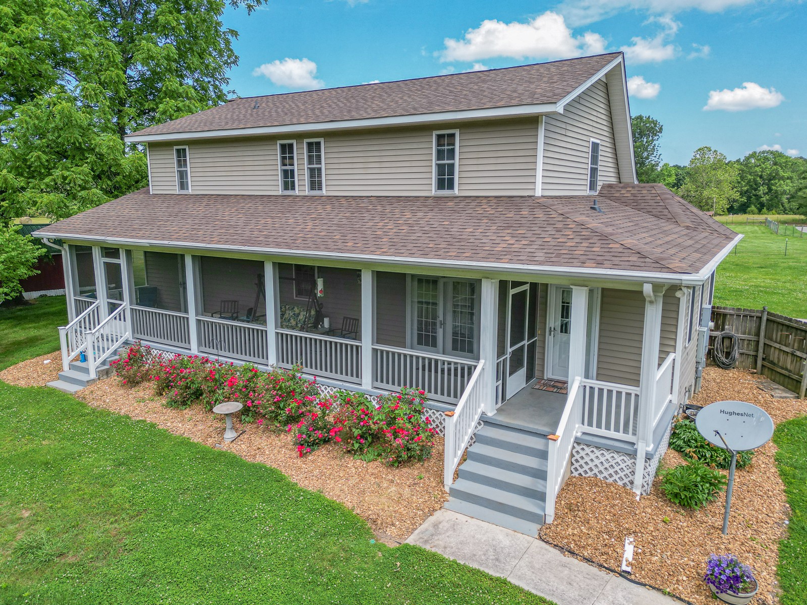 1421 Pea Ridge Road Manchester, TN 37355 - Photo 31 of 62 a front view of a house with a garden