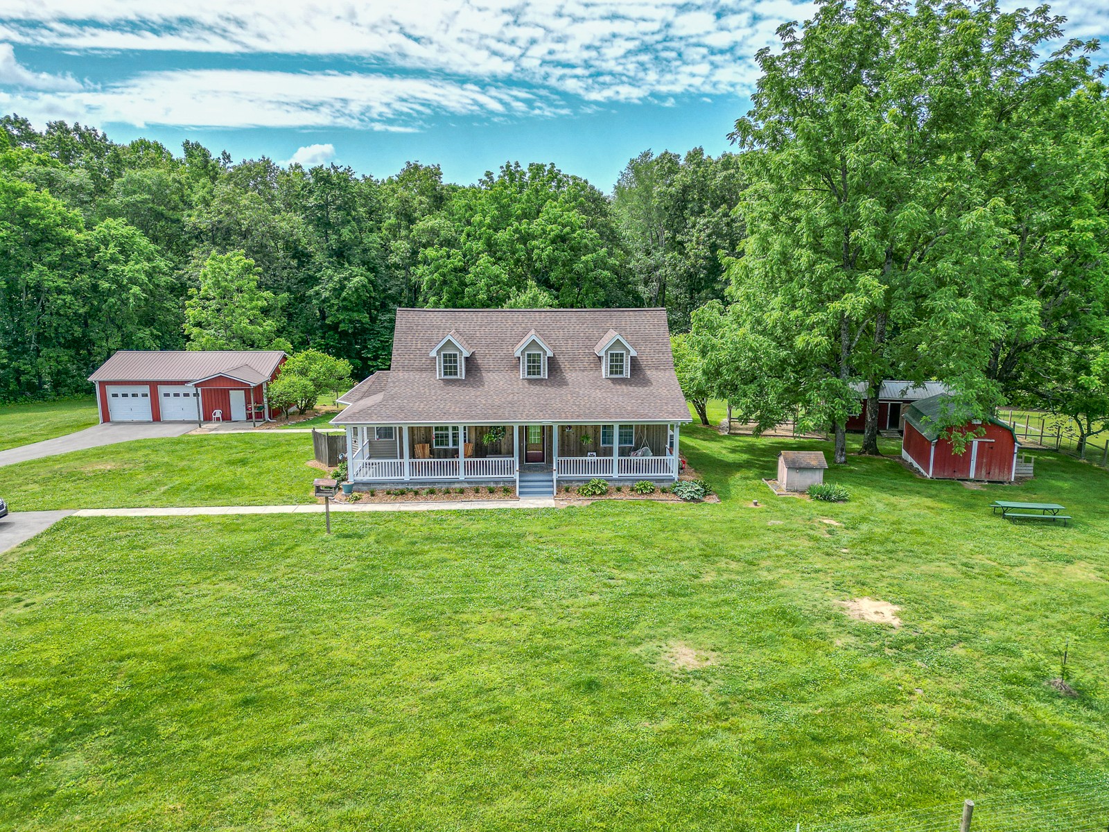 1421 Pea Ridge Road Manchester, TN 37355 - Photo 43 of 62 a front view of a house with garden