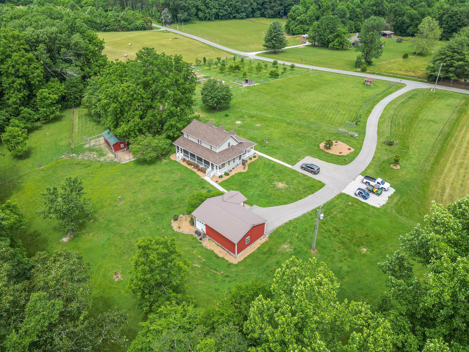 1421 Pea Ridge Road Manchester, TN 37355 - Photo 49 of 62 an aerial view of a golf course with a swimming pool