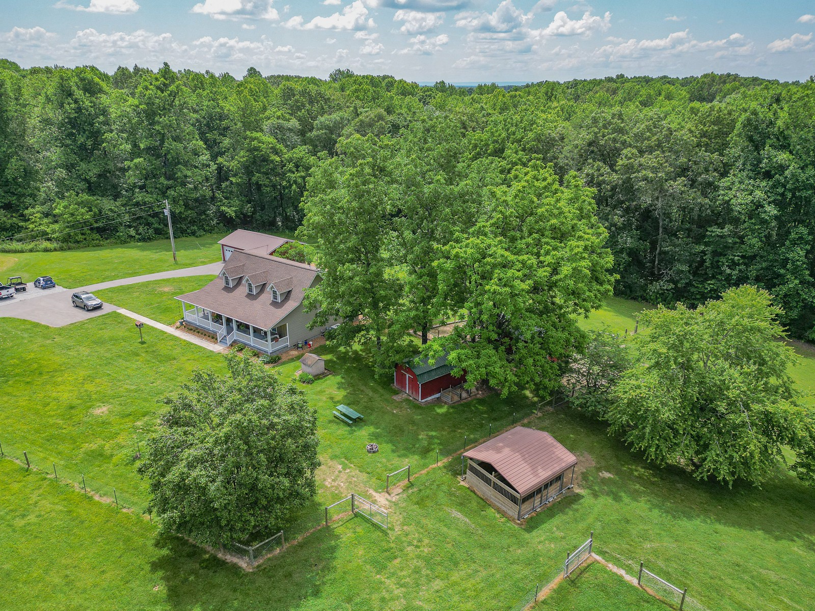 1421 Pea Ridge Road Manchester, TN 37355 - Photo 59 of 62 a garden view with a seating space
