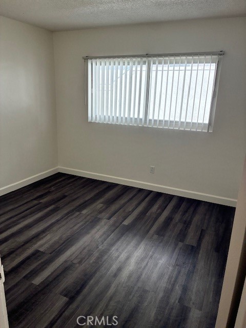 640 West Imperial Avenue, Unit 3 El Segundo, CA 90245 - Photo 7 of 9 a view of a room with wooden floor and a window