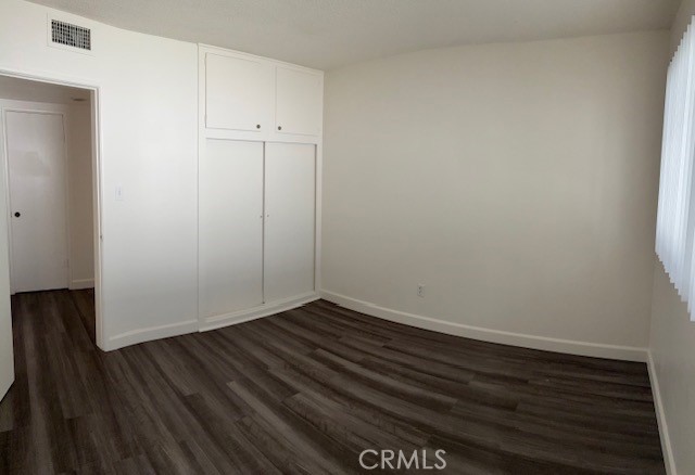 640 West Imperial Avenue, Unit 3 El Segundo, CA 90245 - Photo 8 of 9 a view of an empty room with wooden floor