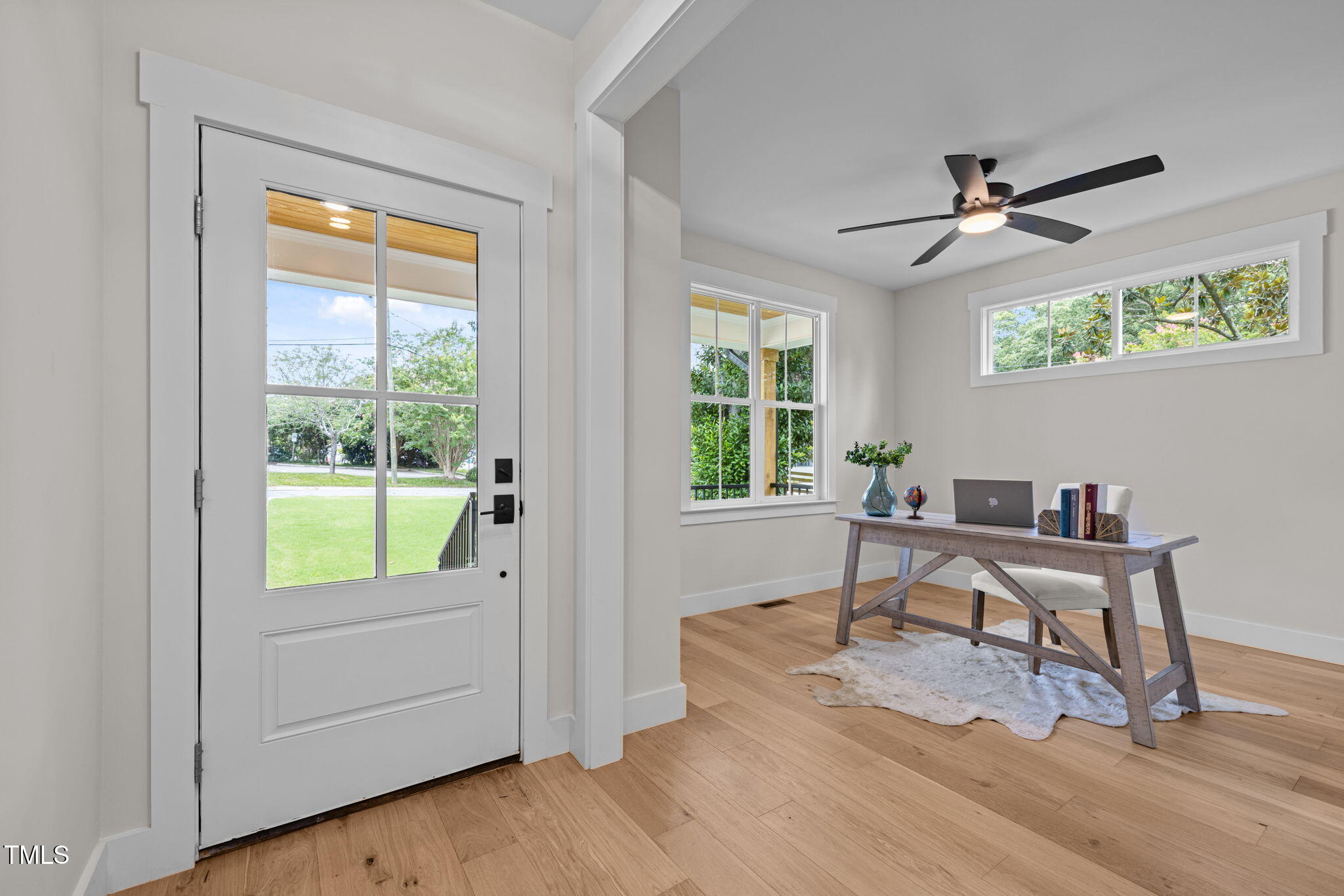 121 West Braxton Foushee Street Carrboro, NC 27510 - Photo 15 of 50 a view of a workspace with furniture and a window